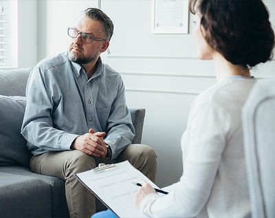 bipolar man talking to a healthcare professional