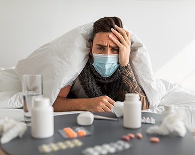 man dealing with covid and its long term effects