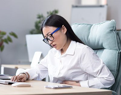 office worker struggling with crohns disease