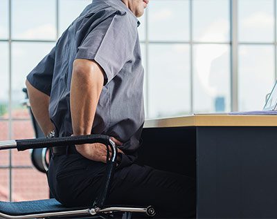 Office worker suffering from lumbar issues